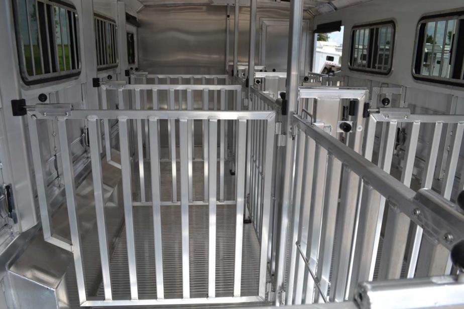 Pen system inside a livestock trailer